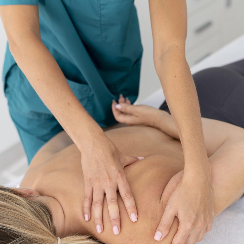 physiotherapist-giving-massage-her-patient-clinic